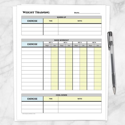 A printable Weight Training Workout Log with Warm-Up and Cool-Down shown on a marble surface with a pen.