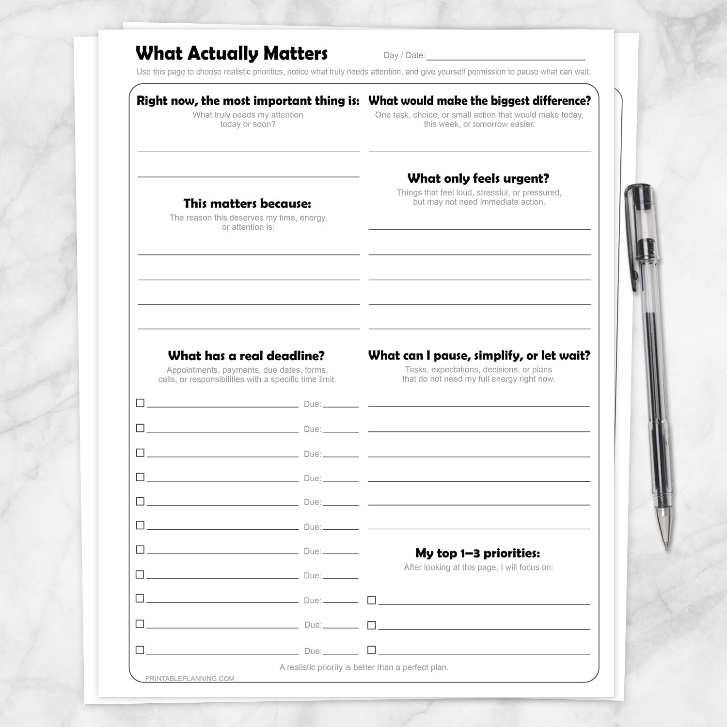What Actually Matters Priority Worksheet shown on a marble surface with a pen.