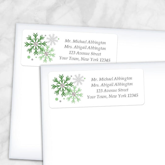 Printable Winter Green Gray Snowflake Address Labels at Printable Planning. Shown on envelopes.