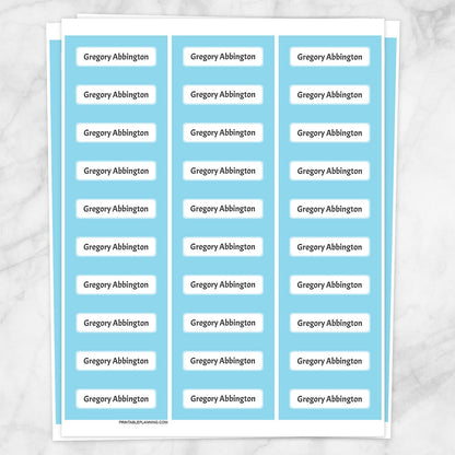 Printable Blue Border Name Labels for School Supplies at Printable Planning. Sheet of 30 labels.