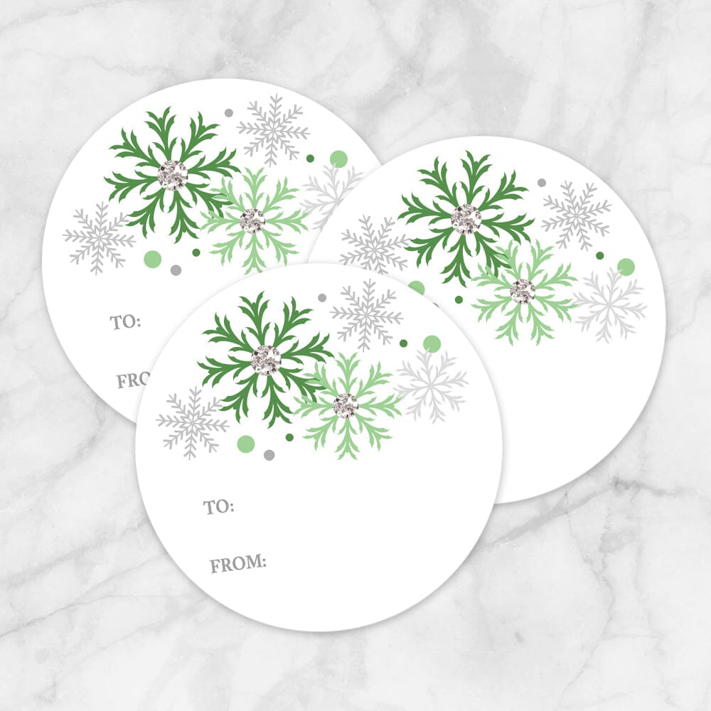Printable Green Snowflake Gift Tag Stickers at Printable Planning. Example of 3 stickers.